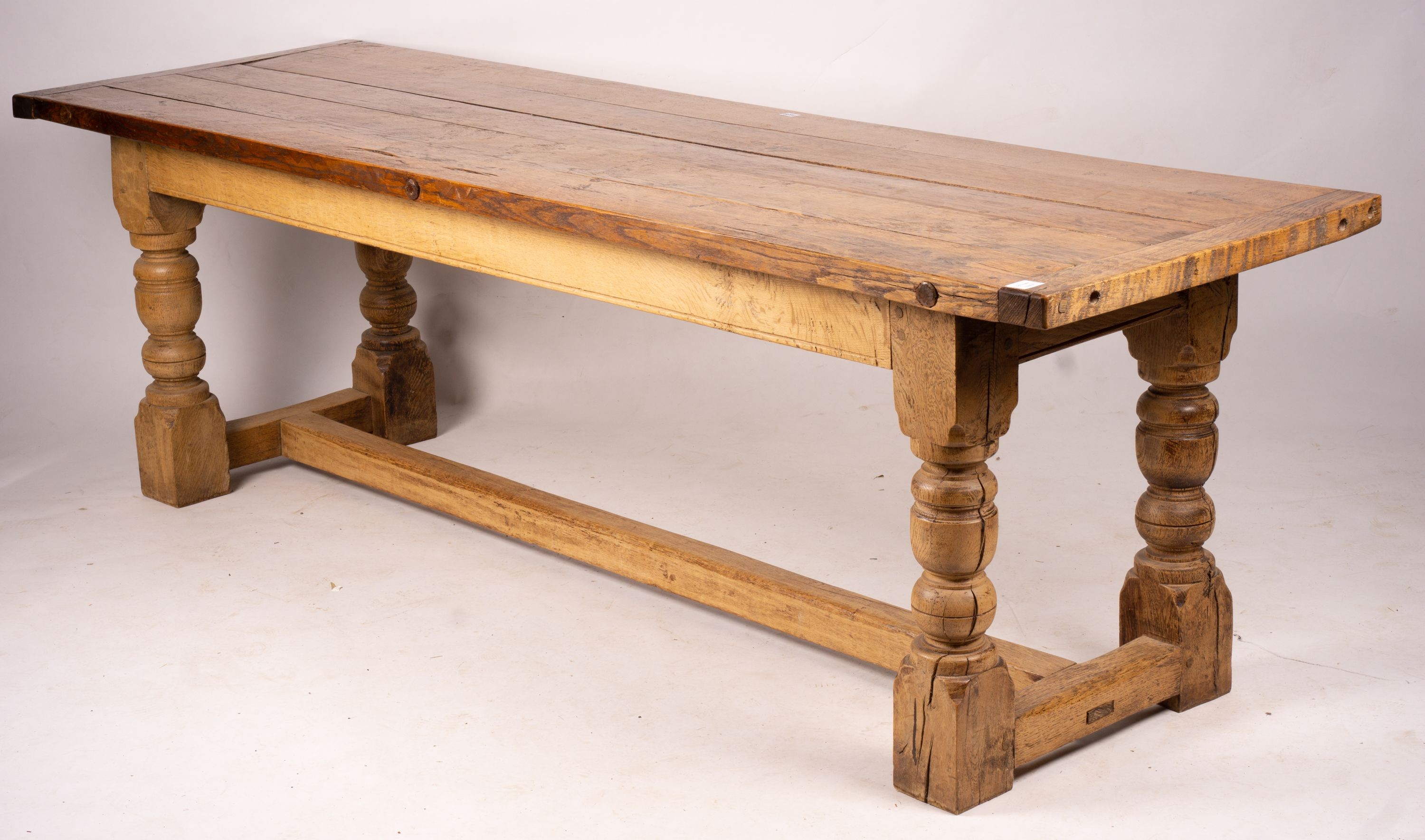 An 18th century style rectangular oak refectory dining table, length 238cm, depth 73cm, height 75cm